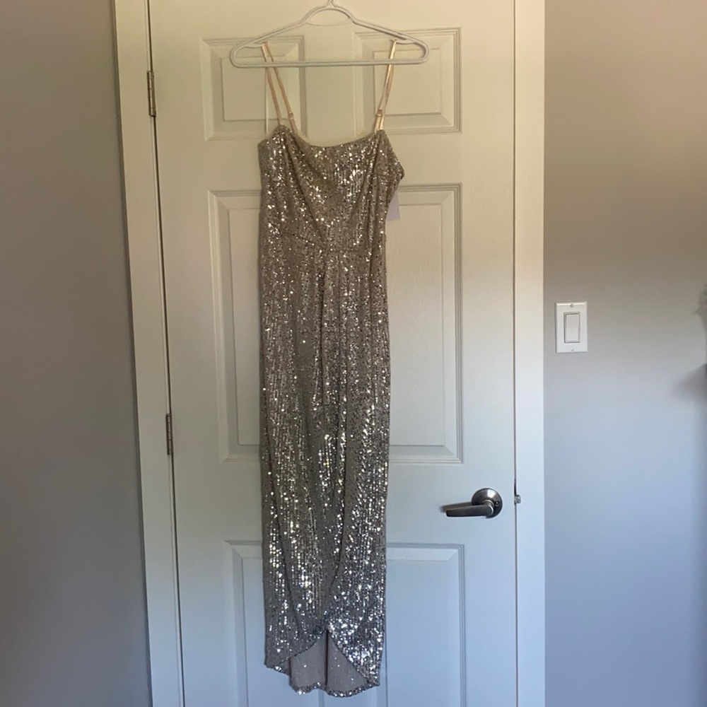 Brand new mid length sequins dress
